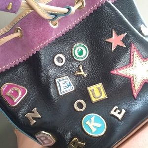Brand new Dooney & Bourke drawstring purse